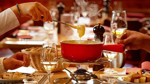 Indulge in bubbling fondue in the heart of Zurich’s Old Town.