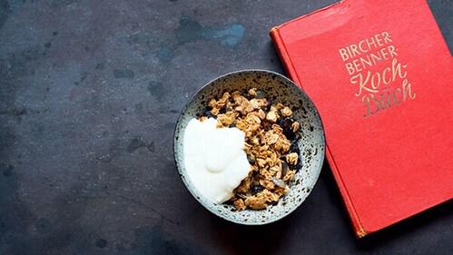 A bowl of fresh, creamy Birchermüesli - A Zurich morning done right.