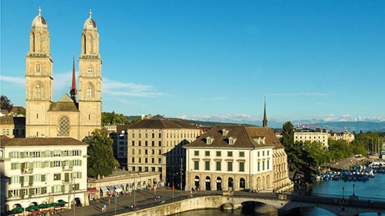 Grossmünster Church, with its iconic twin towers, offers a glimpse into Zurich’s medieval past and panoramic city views from Karlsturm.