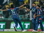 Lucknow Super Giants' Digvesh Rathi (L) celebrates