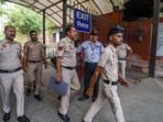 Police personnel investigate after the Dwarka court's Chief Judicial Magistrate received an email about there being a bomb planted in the court's premises, in New Delhi, Wednesday, April 16, 2025. 