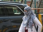 As temperatures rise in Delhi-NCR, commuters cover their heads to escape the heat in Sector 38A, in Noida, As temperatures rise in Delhi-NCR, commuters cover their heads to escape the heat in Sector 38A, in Noida,