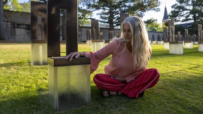 Aren Almon sits next to&nbsp;the memorial chair for her daughter, Baylee Almon,&nbsp;at the Oklahoma City National Memorial. (Photo by Nick Oxford/AP)&nbsp; 