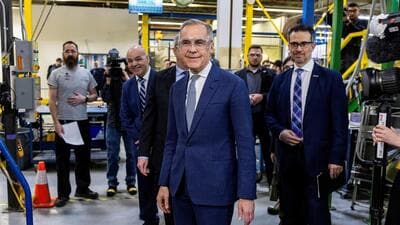 Canada's Prime Minister Mark Carney tours the factory floor before making an announcement during his Liberal Party election campaign tour at Nova Bus, in Saint-Eustache, Quebec. (REUTERS) Canada's Prime Minister Mark Carney tours the factory floor before making an announcement during his Liberal Party election campaign tour at Nova Bus, in Saint-Eustache, Quebec. (REUTERS)