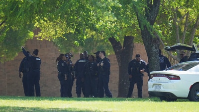 Dallas County Judge Clay Lewis Jenkins, left, and Dallas ISD Superintendent Stephanie Elizalde addressed the media after a shooting at Wilmer-Hutchins High School, Tuesday, April 15, 2025, in Dallas. (Elías Valverde II/The Dallas Morning News via AP) (AP) Dallas County Judge Clay Lewis Jenkins, left, and Dallas ISD Superintendent Stephanie Elizalde addressed the media after a shooting at Wilmer-Hutchins High School, Tuesday, April 15, 2025, in Dallas. (Elías Valverde II/The Dallas Morning News via AP) (AP)