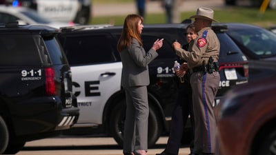 Parents picked up their children at Wilmer-Hutchins High School, “I turned around, all I heard was seven gunshots. I grabbed a teacher and ran in the room,” student Patrick Campos told NBC5 (AP Photo/Julio Cortez) (AP) Parents picked up their children at Wilmer-Hutchins High School, “I turned around, all I heard was seven gunshots. I grabbed a teacher and ran in the room,” student Patrick Campos told NBC5 (AP Photo/Julio Cortez) (AP)