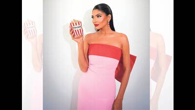 Dubai Bling star Farhana Bodi loves her popcorn-bucket-shaped purse. Dubai Bling star Farhana Bodi loves her popcorn-bucket-shaped purse.