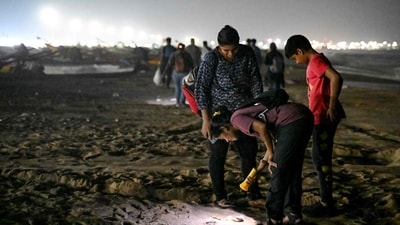 One volunteer spotted the eggs by excavating a potential nesting location until his hand was elbow-deep in the sand, as reported by the Associated Press. With great care, he and other volunteers removed the eggs, counting 137 in all. They were taken to a neighbouring hatchery, where they were safe, in a cotton bag. In pic: Volunteers, along with forest department staff members, collect the eggs of Olive Ridley sea turtles at Marina Beach in Chennai (AP) One volunteer spotted the eggs by excavating a potential nesting location until his hand was elbow-deep in the sand, as reported by the Associated Press. With great care, he and other volunteers removed the eggs, counting 137 in all. They were taken to a neighbouring hatchery, where they were safe, in a cotton bag. In pic: Volunteers, along with forest department staff members, collect the eggs of Olive Ridley sea turtles at Marina Beach in Chennai (AP)
