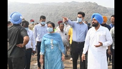 Mayor Inderjit Kaur and MC commissioner Aaditya Dachalwal inspecting the ongoing works at main dump site in Ludhiana on Wednesday. (HT Photo)