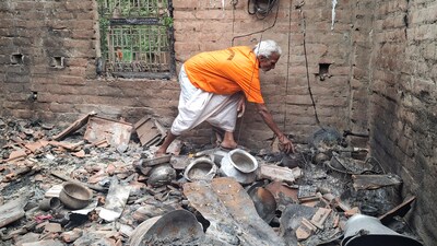 A man goes through the charred remains in a house at the violence-affected Samsergunj area, in Murshidabad on Tuesday. Following the violent protests against the Waqf (Amendment) Act 2025, the displaced families took refuge in adjoining Malda district. (Saikat Paul/ANI) A man goes through the charred remains in a house at the violence-affected Samsergunj area, in Murshidabad on Tuesday. Following the violent protests against the Waqf (Amendment) Act 2025, the displaced families took refuge in adjoining Malda district. (Saikat Paul/ANI)
