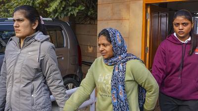 Neelam Azad (centre). (PTI) Neelam Azad (centre). (PTI)