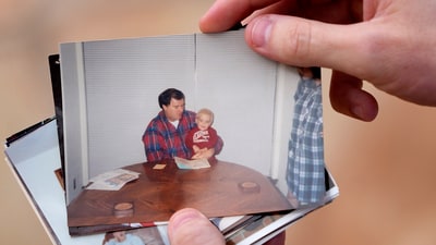 Austin Allen shows a photo of himself with his deceased father, Ted Allen, during an interview in Oklahoma City on March 12, 2025. Austin was 4 years old when his father died in the bombing of the Alfred P. Murrah Federal Building. (AP Photo/LM Otero) (AP)