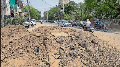The damaged road at BRS Nagar in Ludhiana on Wednesday. (Gurpreet Singh/HT)