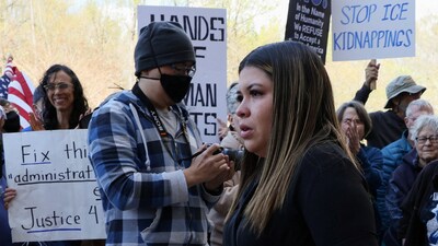 Maryland stand in solidarity with Abrego Garcia as people circle around his wife and children, holding signs reading “Fix Your Mistake" and “I stand with Kilmar.” REUTERS/Leah Millis (REUTERS)