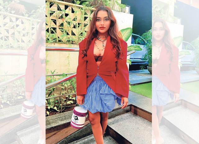 Chaitanya Kenchammanahoskote loves her LV paint-can bag. Chaitanya Kenchammanahoskote loves her LV paint-can bag.