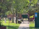FSU students walking with raised hands amid active shooter alert FSU students walking with raised hands amid active shooter alert