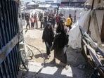 Palestinians inspect the damage after an Israeli strike on a school housing displaced Palestinians in Jabalia in the northern Gaza Strip on April 17, 2025. 