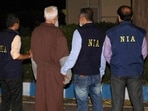 National Investigation Agency (NIA) officials along with Tahawwur Hussain Rana. National Investigation Agency (NIA) officials along with Tahawwur Hussain Rana.
