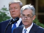 FILE PHOTO: US President Donald Trump looks on as Jerome Powell, his then-nominee to lead the US Federal Reserve, speaks at the White House in Washington DC in November 2017.