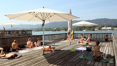 Experience the vibrant summer in Zurich, from lakeside adventures to open-air markets and festivals. Experience the vibrant summer in Zurich, from lakeside adventures to open-air markets and festivals.