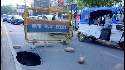 Cave-in on Shahnajaf road. (Mushtaq Ali/HT Photo) Cave-in on Shahnajaf road. (Mushtaq Ali/HT Photo)