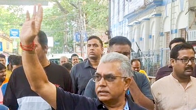 BJP leader Dilip Ghosh waves at supporters as he returns after a morning walk at Berhampore in Murshidabad district of West Bengal, Thursday, Apr. 10, 2025. (PTI FILE)