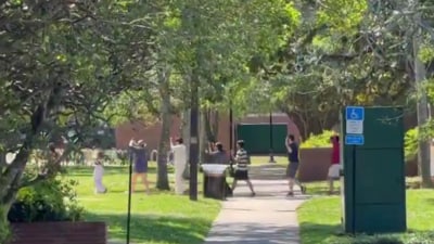 FSU students walking with raised hands amid active shooter alert (X/samuelffisher) FSU students walking with raised hands amid active shooter alert (X/samuelffisher)