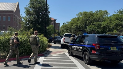 Dozens of patrol vehicles, including a forensics van, are stationed outside of Florida State University’s student union building, the scene of a shooting, Thursday, April 17, 2025, in Tallahassee, Fla. (AP) Dozens of patrol vehicles, including a forensics van, are stationed outside of Florida State University’s student union building, the scene of a shooting, Thursday, April 17, 2025, in Tallahassee, Fla. (AP)