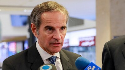 Director-General of the International Atomic Energy Agency (IAEA) Rafael Grossi speaking to reporters during a tour of the organisation headquarters in Tehran with the head of the AEOI on April 17, 2025. (AFP)