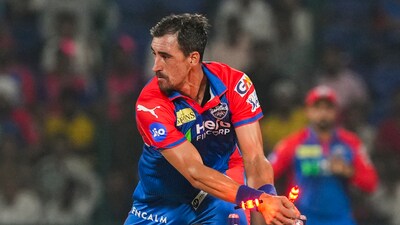 Mitchell Starc runs out RR batter Riyan Parag. (PTI) Mitchell Starc runs out RR batter Riyan Parag. (PTI)