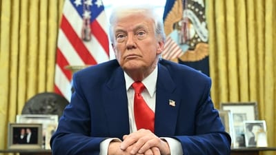 US President Donald Trump looks on after signing an executive order in the Oval Office of the White House. (AFP) US President Donald Trump looks on after signing an executive order in the Oval Office of the White House. (AFP)