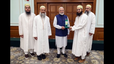 Prime Minister Narendra Modi being felicitated by a delegation from the Dawoodi Bohra community, in New Delhi on Thursday. (ANI PHOTO) Prime Minister Narendra Modi being felicitated by a delegation from the Dawoodi Bohra community, in New Delhi on Thursday. (ANI PHOTO)