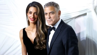 Amal Clooney has been turning heads in NYC with her fashion while supporting husband George Clooney's successful Broadway show. (Photo by John Lamparski / AFP) (AFP) Amal Clooney has been turning heads in NYC with her fashion while supporting husband George Clooney's successful Broadway show. (Photo by John Lamparski / AFP) (AFP)
