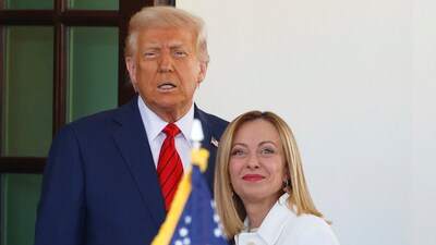 President Donald Trump, center, greets Italy's Prime Minister Giorgia Meloni, right, upon her arrival at the White House, Thursday, April 17, 2025, in Washington. (AP Photo/Tom Brenner) (AP) President Donald Trump, center, greets Italy's Prime Minister Giorgia Meloni, right, upon her arrival at the White House, Thursday, April 17, 2025, in Washington. (AP Photo/Tom Brenner) (AP)