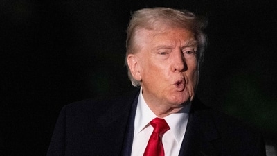 Donald Trump has been accused of paying El Salvador for keeping Kilmar Abrego Garcia in prison (AFP)