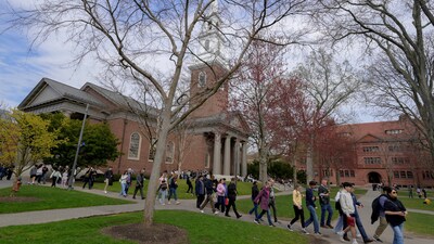Students walk on the campus of Harvard University in Cambridge, Massachusetts, U.S., April 15, 2025. (REUTERS)