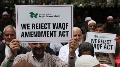 People's Democratic Party (PDP) workers hold placards reading Reject WAQF bill during a party workers’ convention at Sher-e-Kashmir Park, in Srinagar, on 17 April 2025. (Waseem Andrabi /Hindustan Times) People's Democratic Party (PDP) workers hold placards reading Reject WAQF bill during a party workers’ convention at Sher-e-Kashmir Park, in Srinagar, on 17 April 2025. (Waseem Andrabi /Hindustan Times)