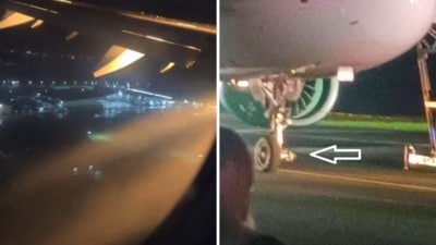 Passengers captured the missing front wheel and the glow of flames rising from the plane. (X/@fl360aero)