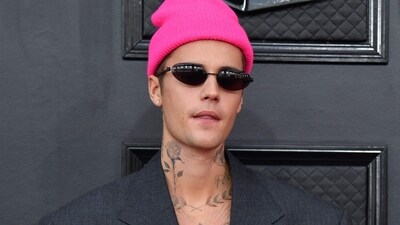(FILES) Justin Bieber's team has issued a statement on reports stating that he is in debt. (Photo by ANGELA WEISS / AFP) (AFP) (FILES) Justin Bieber's team has issued a statement on reports stating that he is in debt. (Photo by ANGELA WEISS / AFP) (AFP)
