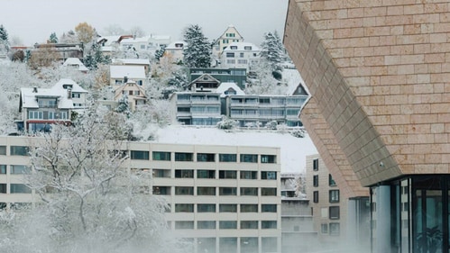 Relax in the rooftop infinity pool at Hürlimannbad & Spa while soaking in panoramic views of Zurich’s skyline.
