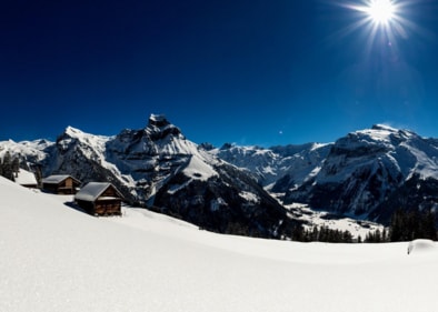 Snow-covered peaks and thrilling heights from atop Mt. Titlis in winter.