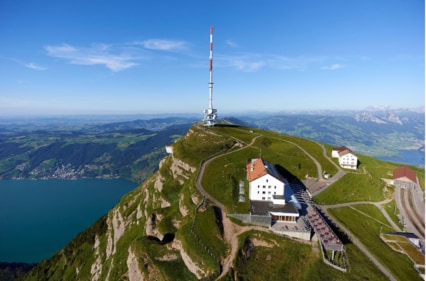 Sweeping lake views and alpine paths from the sunny summit of Mt. Rigi.