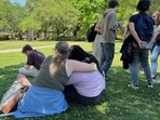 People comfort each other on Florida State University's campus in Tallahassee, where law enforcement responded to a reported active shooter incident on April 17, 2025. People comfort each other on Florida State University's campus in Tallahassee, where law enforcement responded to a reported active shooter incident on April 17, 2025.