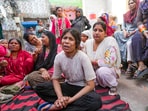 Relatives grieve after a 17-year-old boy was stabbed to death in Delhi's Seelampur area.
