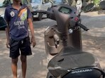 An underage biker in Bengaluru allegedly crashed into a car by doing wheelie stunt. An underage biker in Bengaluru allegedly crashed into a car by doing wheelie stunt.