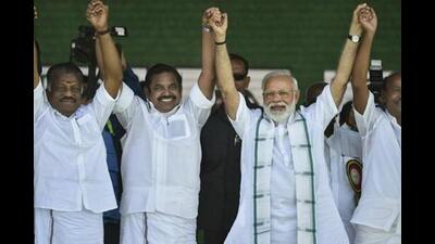 Chennai: Prime Minister Naredra Modi, Tamil Nadu Chief Minister K Palaniswami, Dy CM O Panneerselvam and PMK founder Ramadoss join hands during a public rally of the BJP-AIADMK-PMK alliance, in Chennai, Wednesday, March 6, 2019. (AP)
