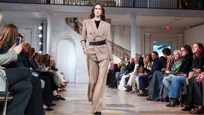 The models displayed stellar looks from the collection that also included a classic Lauren combination of beige trousers, a tailored jacket, a belt cinched on the waist, and a black crewneck top.&nbsp; (REUTERS)