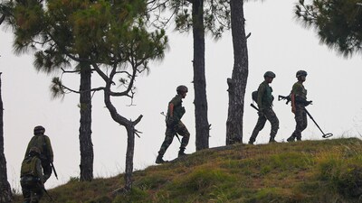 Army personnel patrol near the Line of Control (LOC) in Rajouri district. (PTI FILE/ Representative image ) Army personnel patrol near the Line of Control (LOC) in Rajouri district. (PTI FILE/ Representative image )