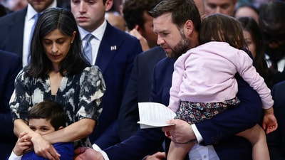 During the service, Vance's son clung to Usha as he whispered something to him, creating a touching, intimate moment amid the sacred ceremony.&nbsp; (REUTERS/Yara Nardi)