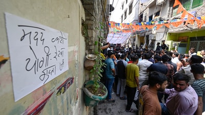 A crowd gathered outside the house of a 17-year-old boy who was stabbed to death in the Seelampur area in New Delhi, India, on Friday, April 18, 2025. (Sanjeev Verma / Hindustan Times) A crowd gathered outside the house of a 17-year-old boy who was stabbed to death in the Seelampur area in New Delhi, India, on Friday, April 18, 2025. (Sanjeev Verma / Hindustan Times)